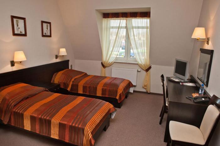 Hotel Portius à Krosno Chambre photo
