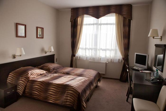 Hotel Portius à Krosno Chambre photo
